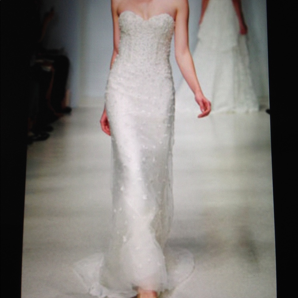 Amsale Christos “Anais” hand beaded wedding gown.